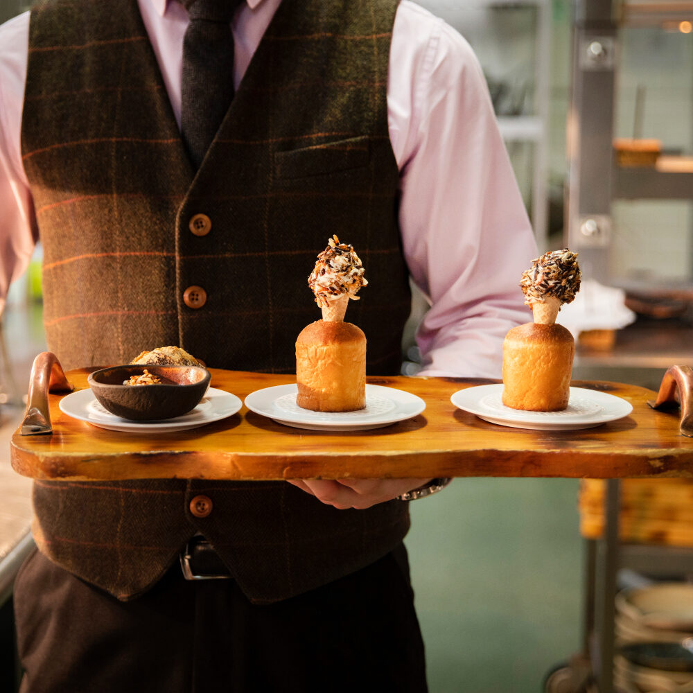 Desserts being carried on a tray
